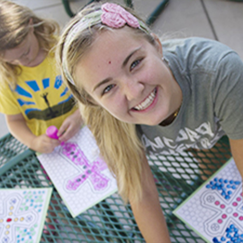 Maddie working with kids